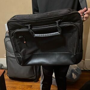 Lap Top carry bag with extra pockets on front and carry strap